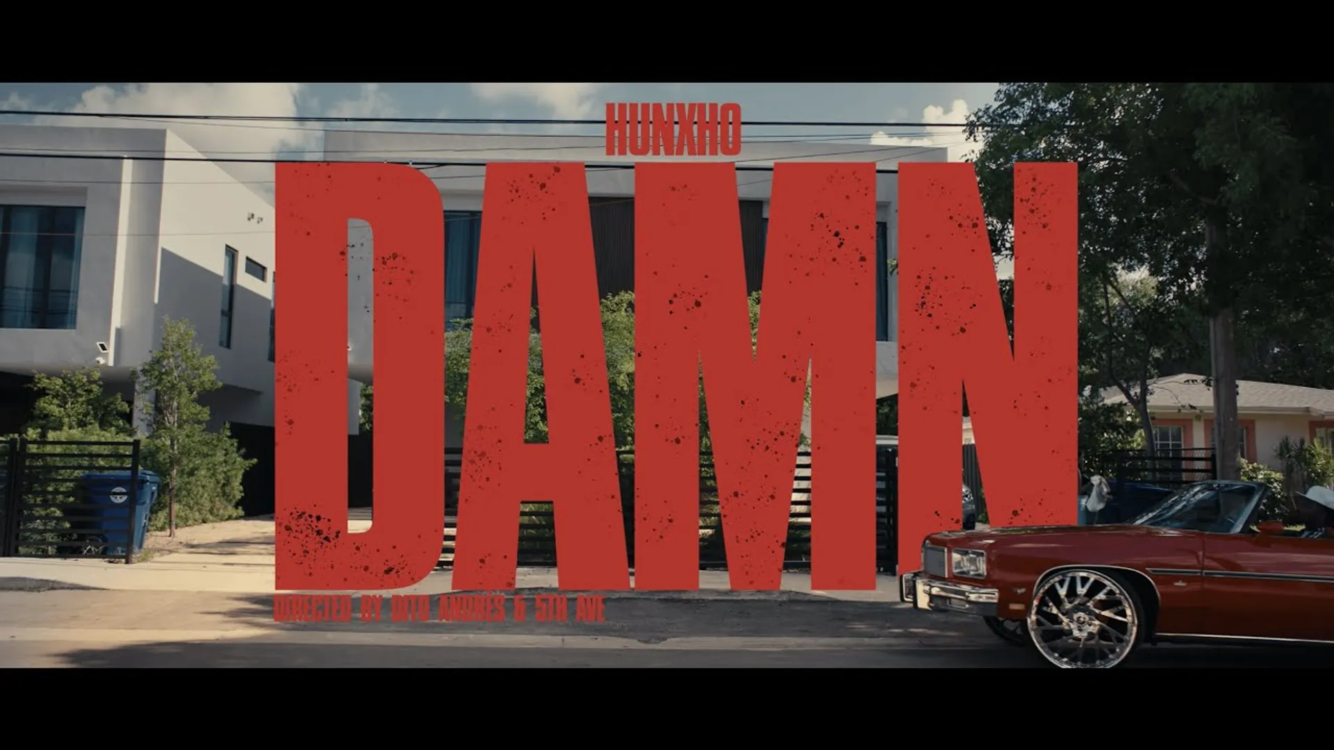 Official music video for 'DAMN' by Hunxho, featuring dramatic lighting and stylized urban settings.